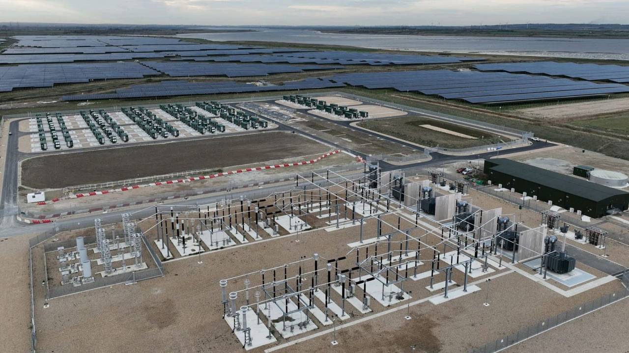 Cleve Hill complex from the air — solar arrays, BESS containers and electrical compound on Helicasol foundations