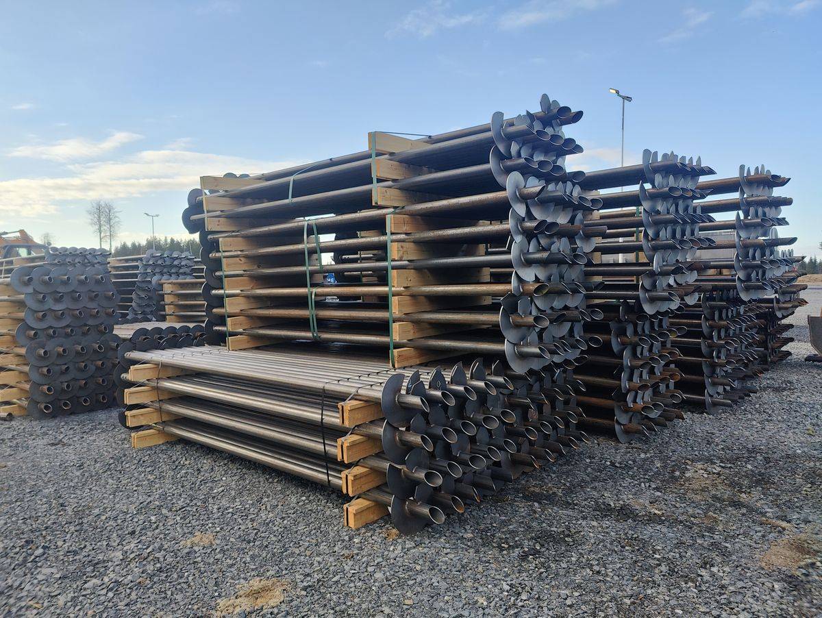 Helical piles stacked at the EN 1090 production yard ready for site delivery